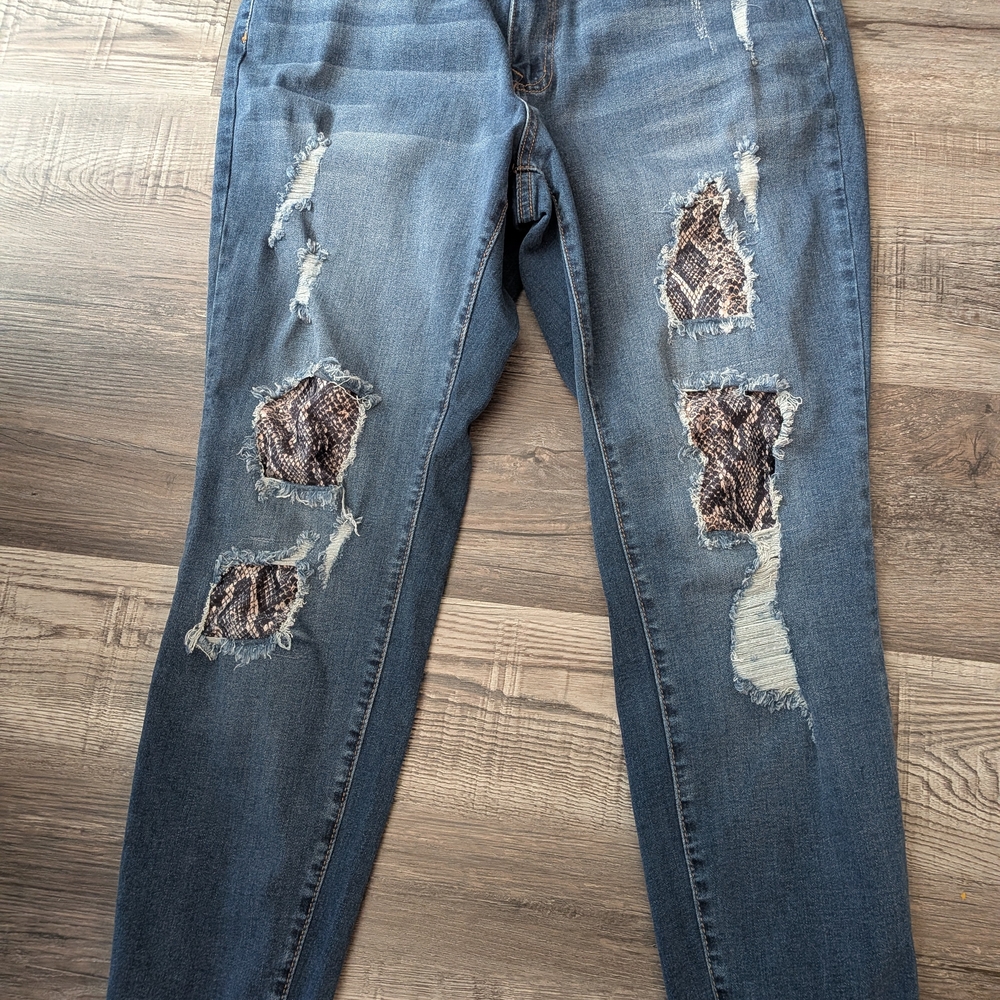 Distressed Blue Jeans with Snake Print Accents